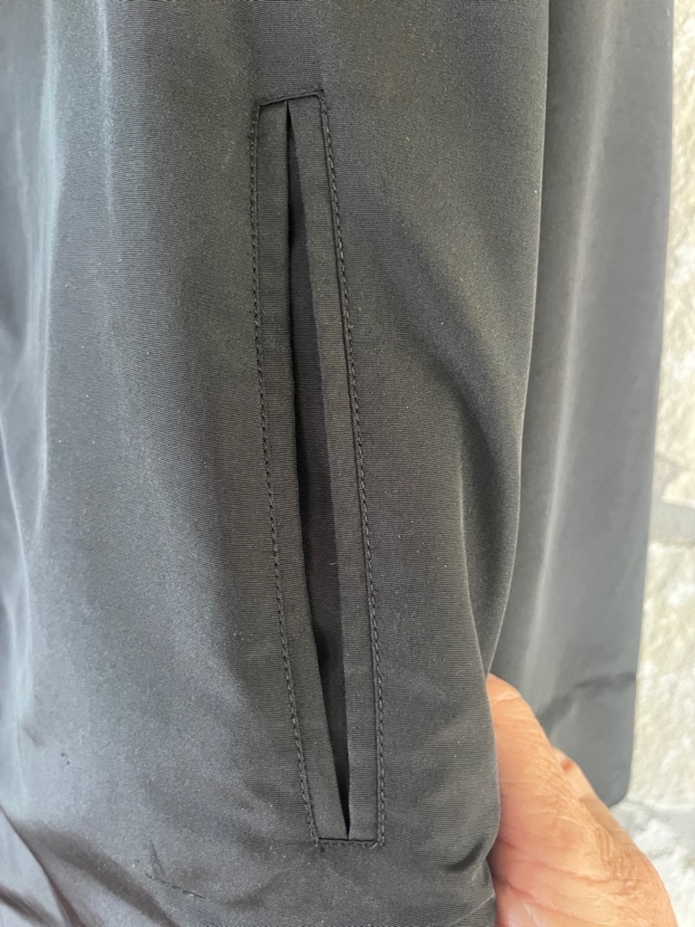 Reversible Tan and Black Hooded Zippered Rain Jacket with Storage Bag - Picture 4 of 8